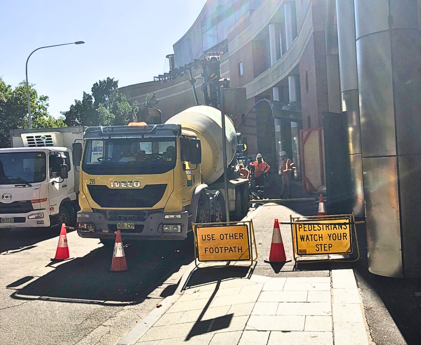 Traffic is managed carefully to divert pedestrians and cars