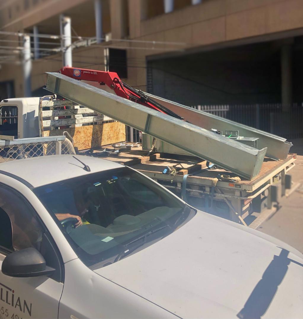 Structural steel fabricated off-site, delivered and rigged to position